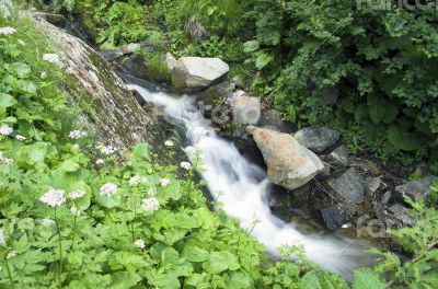 landscape with waterfall in the mountains 