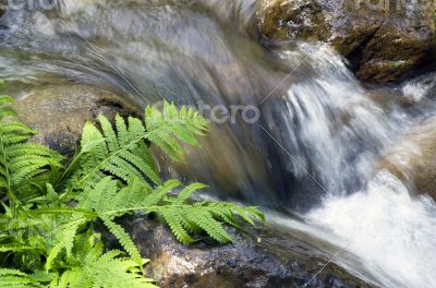 landscape with waterfall in the mountains