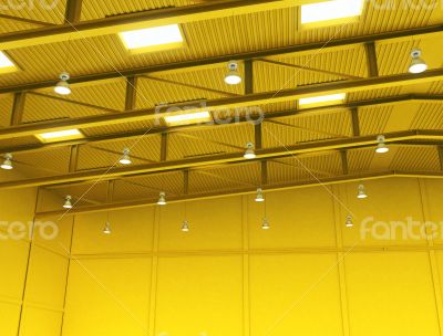 Interior of a empty yellow color warehouse construction