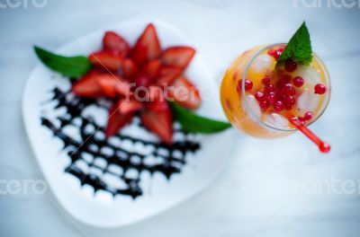 Orange juice and Strawberries with chocolate