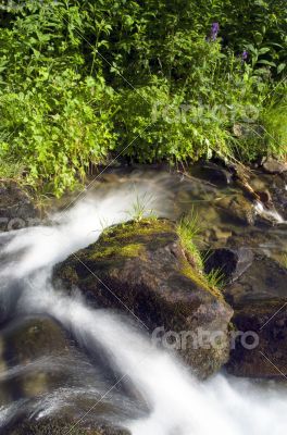 landscape with waterfall in the mountains