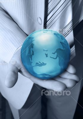 Globe in hands at the businessman