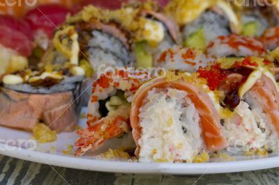 Sushi rolls with vassabi on the plate