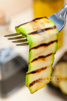 grilled zucchini courgette on a fork