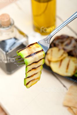 grilled zucchini courgette on a fork