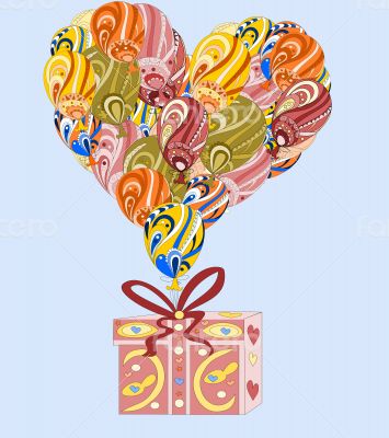 Heart made ​​of colorful air balloons with gift 