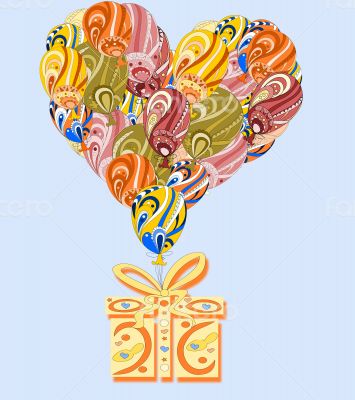 Heart made ​​of colorful air balloons with gift 