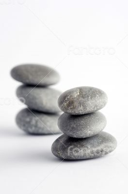 Pyramid of the stones isolated on white background 