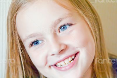 Cute girl with big blue eyes