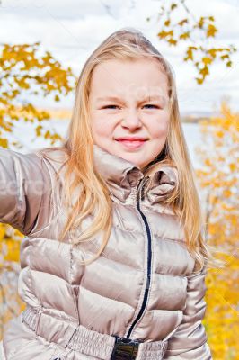 Cute girl in autumn