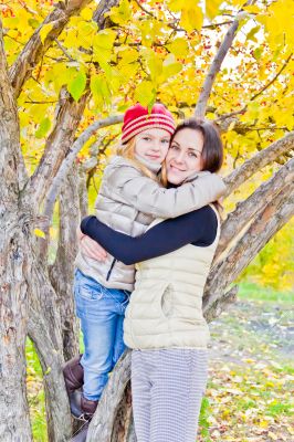 Mother and daughter in autumn