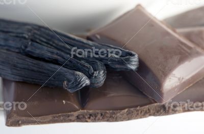 Cup of hot tea with dark chocolate