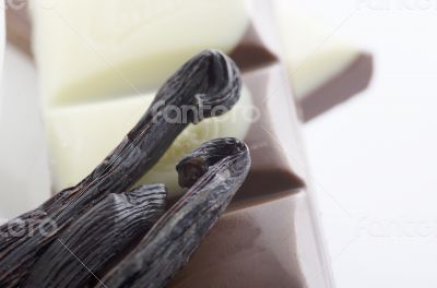 Cup of hot tea with dark chocolate