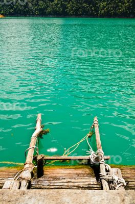 Ladder made of wood into the water
