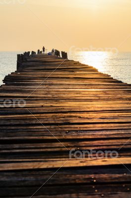 Old wooden pier at sunrise