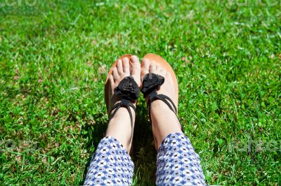 feet in green grass 