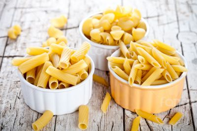 uncooked pasta in three bowls 