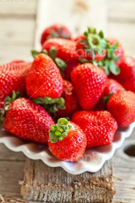 plate with fresh strawberries