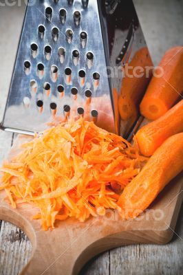 metal grater and carrot