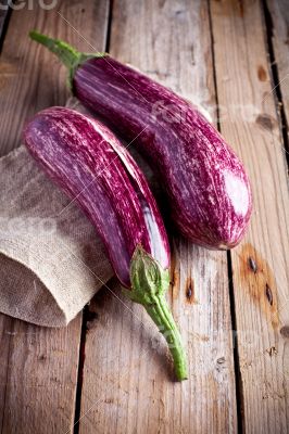 two fresh eggplants