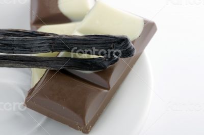 Cup of hot tea with dark chocolate