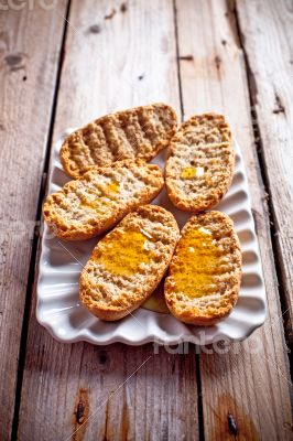 crackers with honey in plate