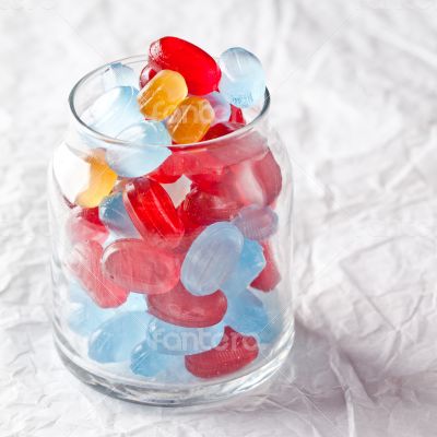 colorful candies in glass jar 