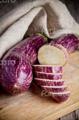 two fresh eggplants