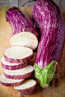 two fresh eggplants