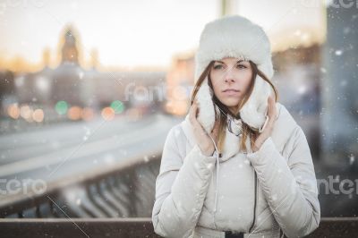 Russian woman in the winter city