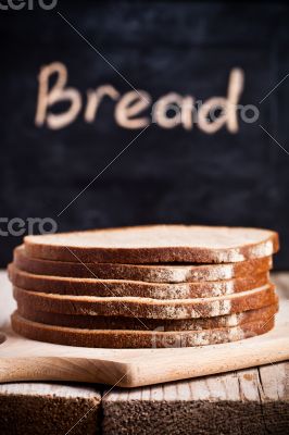 slices of rye bread and blackboard