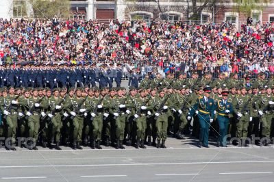 Russian soldiers march at the parade