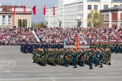 Russian soldiers march at the parade