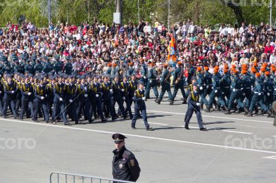Russian soldiers march at the parade