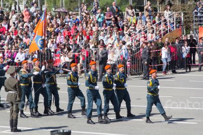 Russian soldiers march at the parade