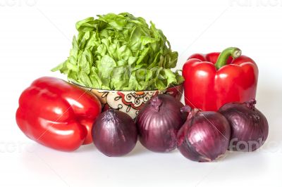Two large red paprikas, red onions and bunch of fresh salad