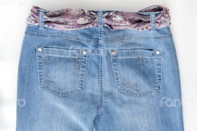 Women\'s jeans with motley silk belts