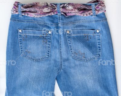 Women\'s jeans with motley silk belts