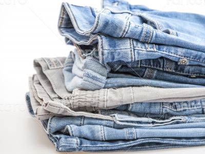 Jeans of indigo color on a show-window of shop