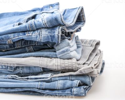 Jeans of indigo color on a show-window of shop