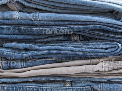 Jeans of indigo color on a show-window of shop