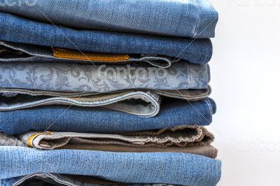 Jeans of indigo color on a show-window of shop