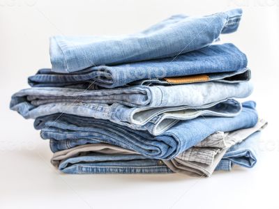 Jeans of indigo color on a show-window of shop