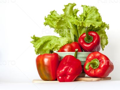 Large red paprika and bunch of fresh salad