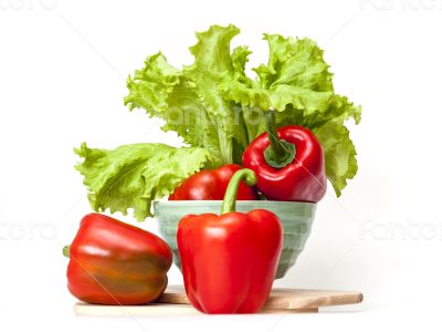 Large red paprika and bunch of fresh salad