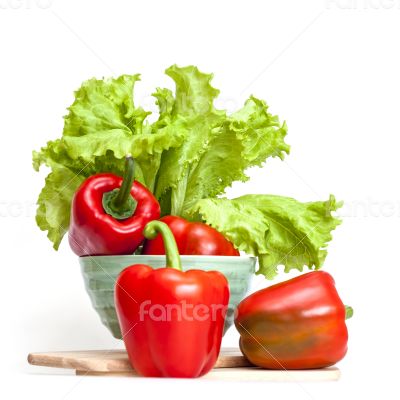 Large red paprika and bunch of fresh salad