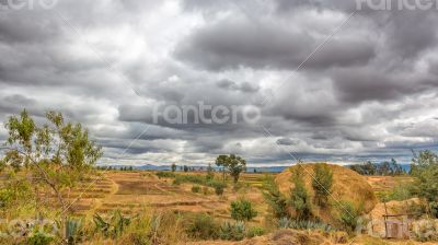 Dark clouds hovering over the fields