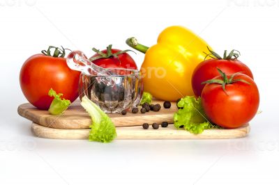 Sweet pepper of yellow color and ripe tomatoes