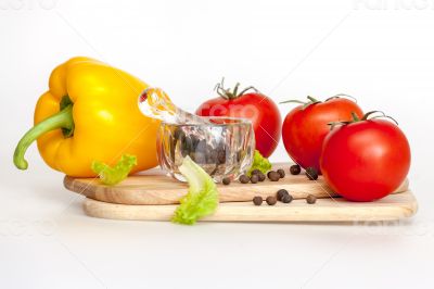 Sweet pepper of yellow color and ripe tomatoes