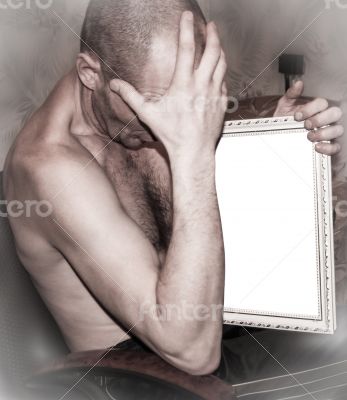  Man holds a picture